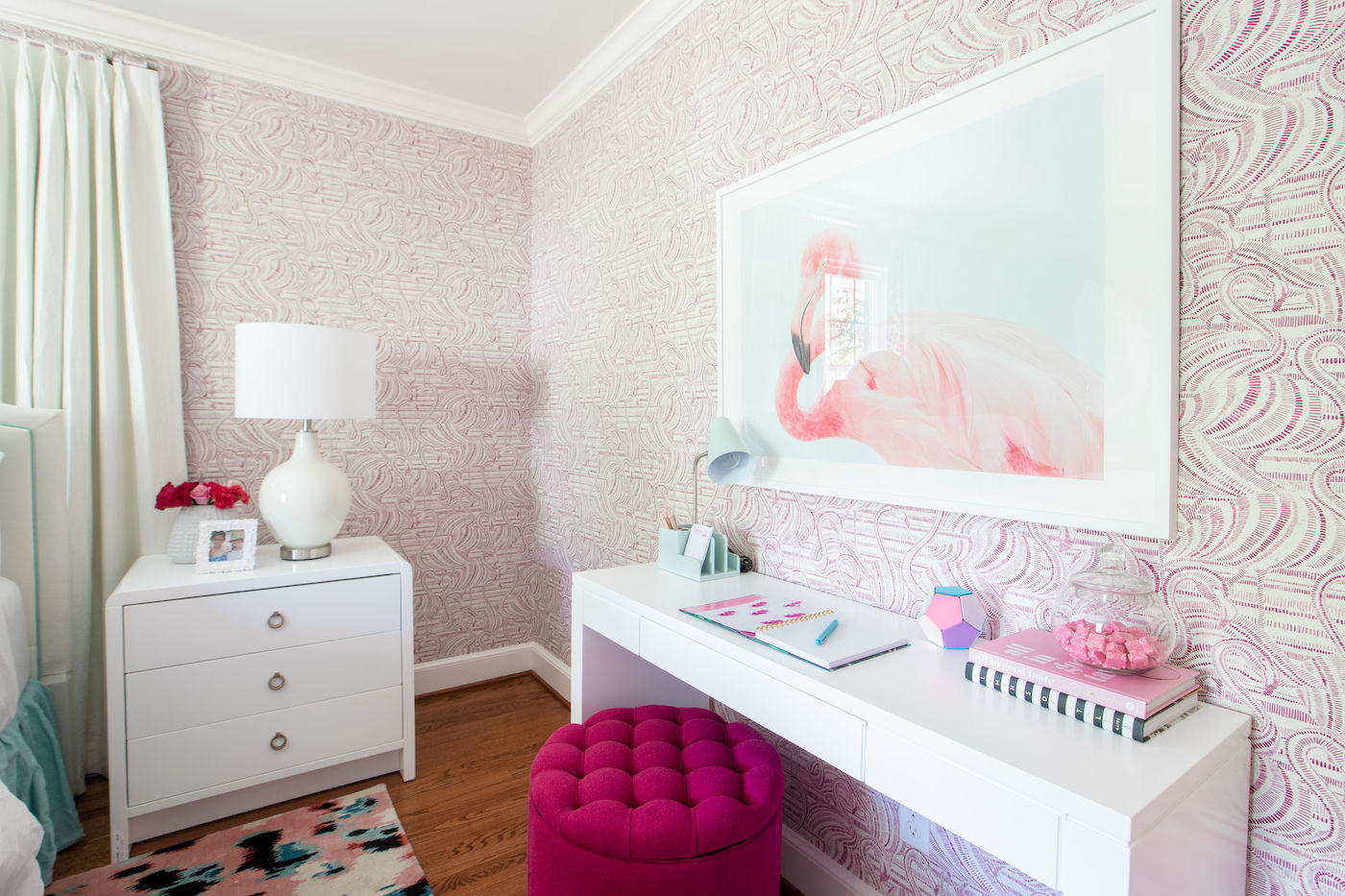 desk-hanging-artwork-pink-ottoman-seat