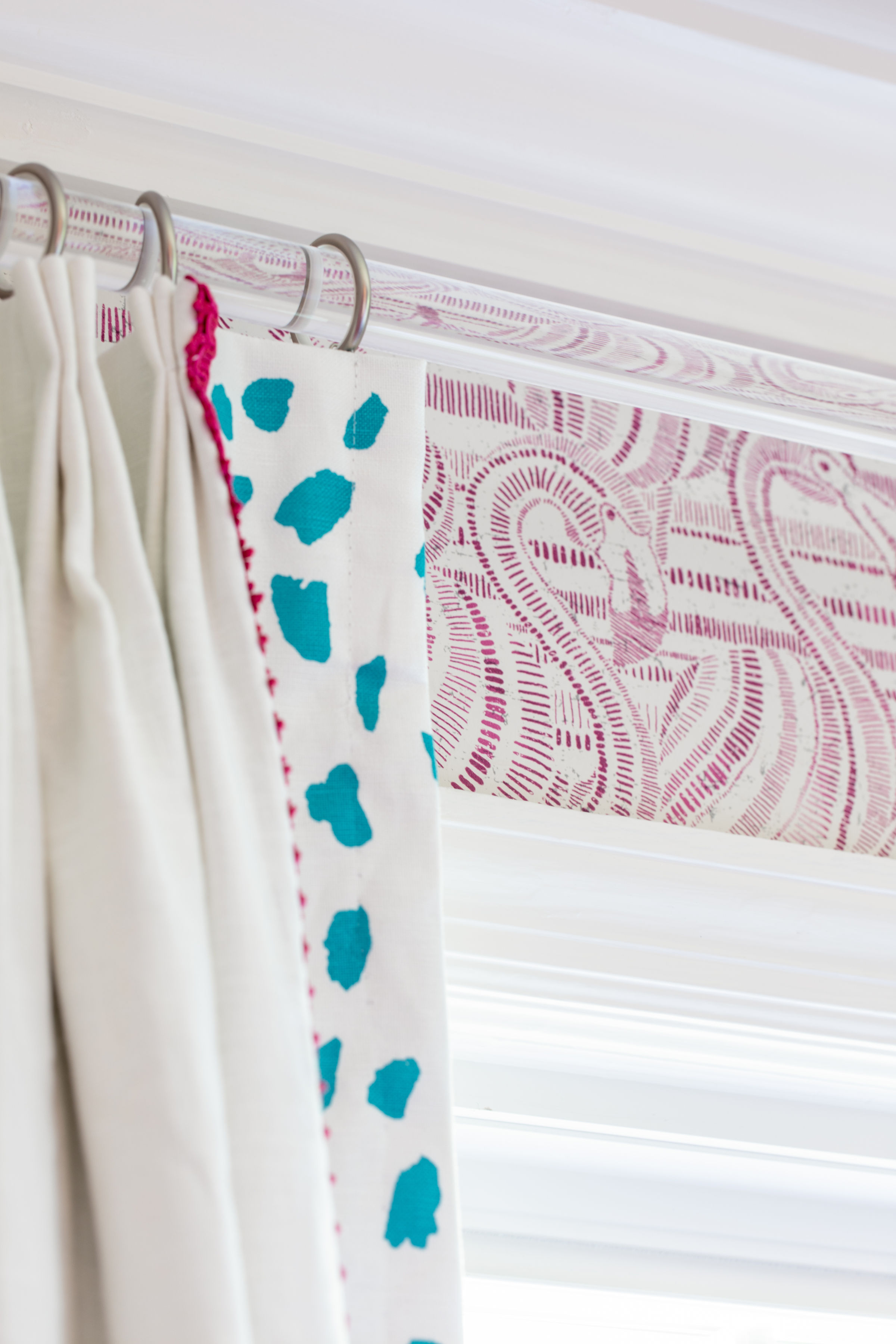drapery detail with flamingo wallpaper